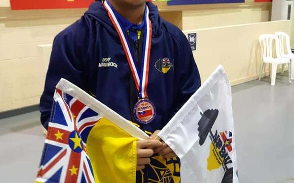 15 year old Kaia Davis wins bronze for Niue in weightlifting