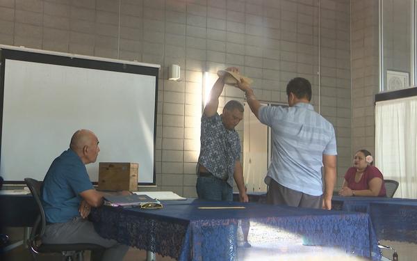Drawing out of a hat determines Makaseau Ioane as duly elected MP for the village of Mutalau