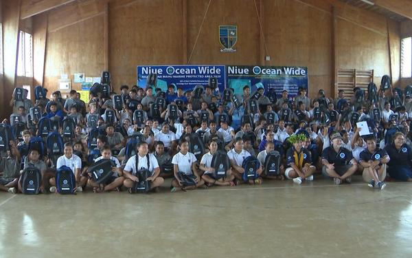 NOW hand out free school bags to students