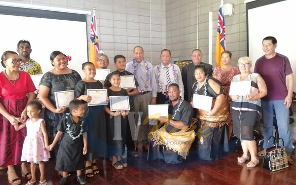 Government leaders officially welcome eleven new permanent residents